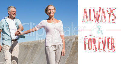 Composite image of happy senior couple walking on the pier