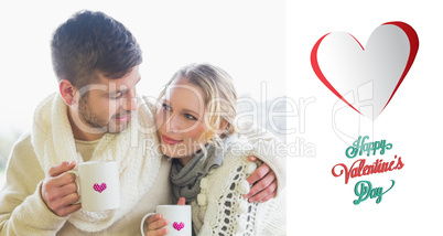 Composite image of loving couple in winter wear with coffee cups