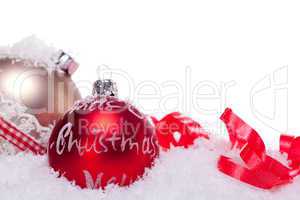 christmas decoration festive red bauble in snow isolated