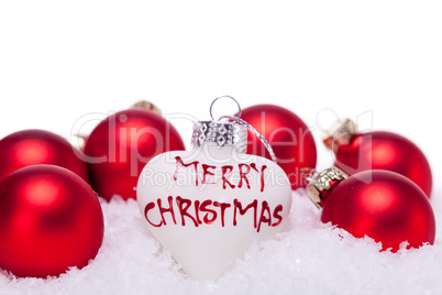 christmas decoration festive red bauble in snow isolated