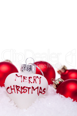 christmas decoration festive red bauble in snow isolated