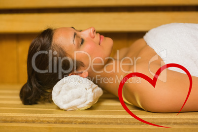 Composite image of peaceful brunette relaxing in a sauna
