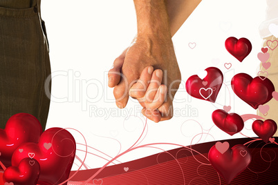 Composite image of happy senior couple holding hands