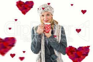 Composite image of smiling woman in winter fashion looking at ca