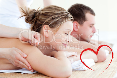 Composite image of loving couple having an acupunctre therapy