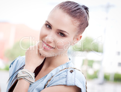 young attraktive happy woman outdoor in summer