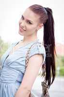 young attraktive happy woman outdoor in summer