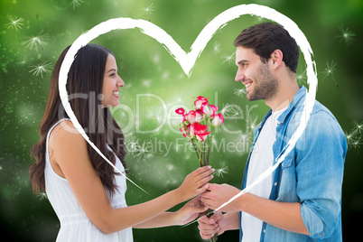 Composite image of happy hipster giving his girlfriend roses