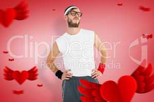 Composite image of geeky hipster posing in sportswear