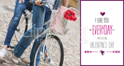 Composite image of hip young couple going for a bike ride