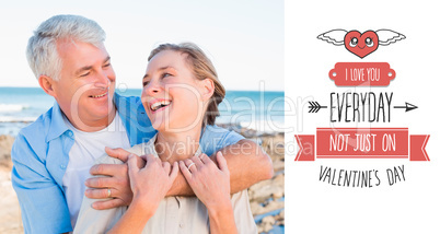 Composite image of happy casual couple by the coast