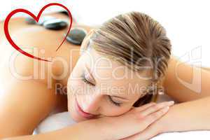 Composite image of pretty woman having a massage