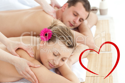 Composite image of relaxing couple having a massage