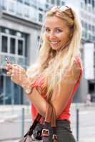Girl smiling while texting
