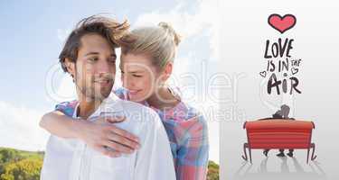 Composite image of smiling couple standing outside together