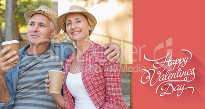 Composite image of happy mature couple drinking coffee on a benc