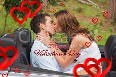 Composite image of beautiful couple kissing in back seat