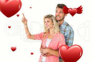 Composite image of attractive young couple embracing and looking