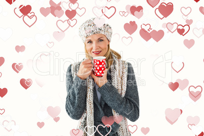 Composite image of smiling woman in winter fashion looking at ca