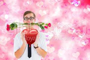 Composite image of romantic geeky hipster