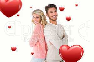 Composite image of attractive couple smiling with arms crossed