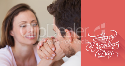 Composite image of close-up of a loving couple holding hands