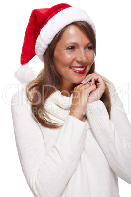 Attractive woman wearing a festive red Santa hat