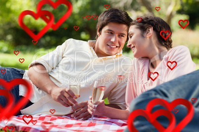 Composite image of man smiling as he looks at his friend during