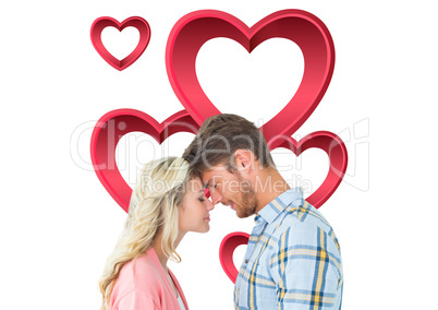 Composite image of attractive couple standing touching heads