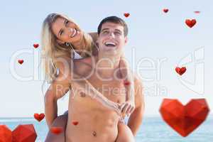 Composite image of laughing man giving his pretty girlfriend a p