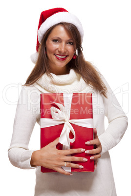 Pretty woman in a Santa hat with a large gift