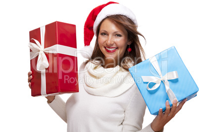 Vivacious woman in a Santa hat celebrating Xmas