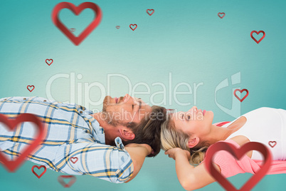 Composite image of attractive young couple sleeping peacefully