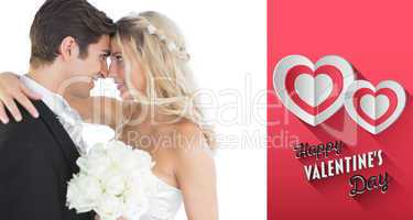 Composite image of beautiful young married couple looking each o