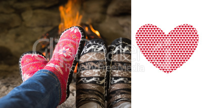 Composite image of close up of romantic legs in socks in front o
