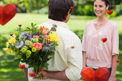 Composite image of man about to present a bouquet of flowers to