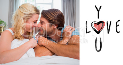 Composite image of cute couple relaxing on bed smiling at each o