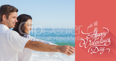 Composite image of romantic couple relaxing on the beach