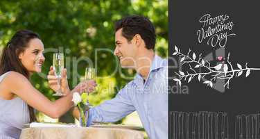 Composite image of couple with champagne flutes sitting at outdo