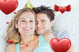Composite image of portrait of an attractive couple hugging and