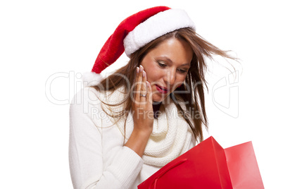 Happy vivacious Christmas shopper