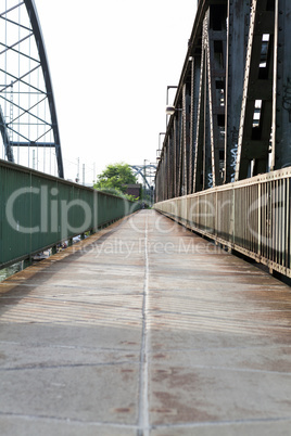 Empty railroad tracks on scale bridge