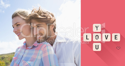 Composite image of smiling couple standing outside together