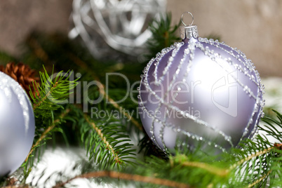 Silver Christmas ornaments in leaves Silver Christmas ornaments in leaves