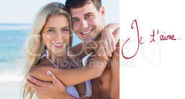 Composite image of beautiful couple hugging and smiling