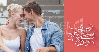 Composite image of hip young couple in denim sitting on steps