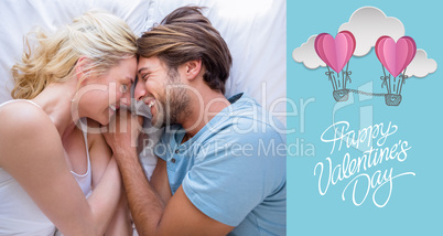 Composite image of cute couple relaxing on bed smiling at each o