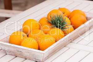 fresh orange fruits decorative on table in summer