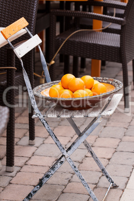 fresh orange fruits decorative on table in summer