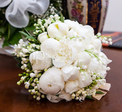 Bridal bouquet with white peonies.